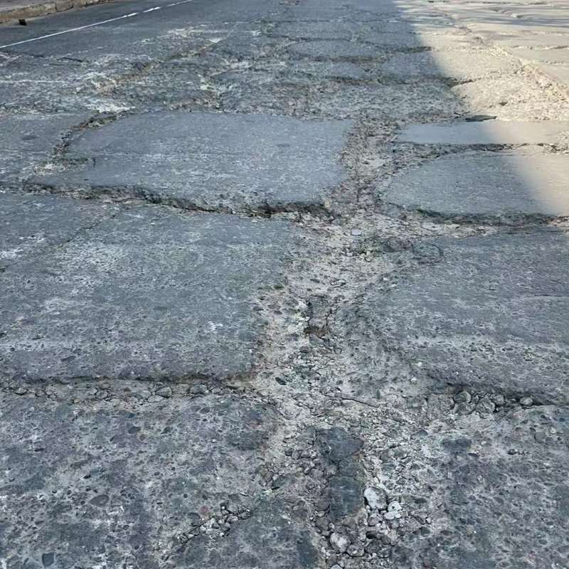 万盛路面起砂露石子修补料